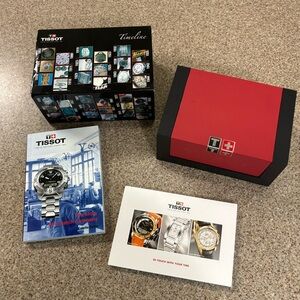 TISSOT presentation watch box with papers, booklets, and pillow cushion